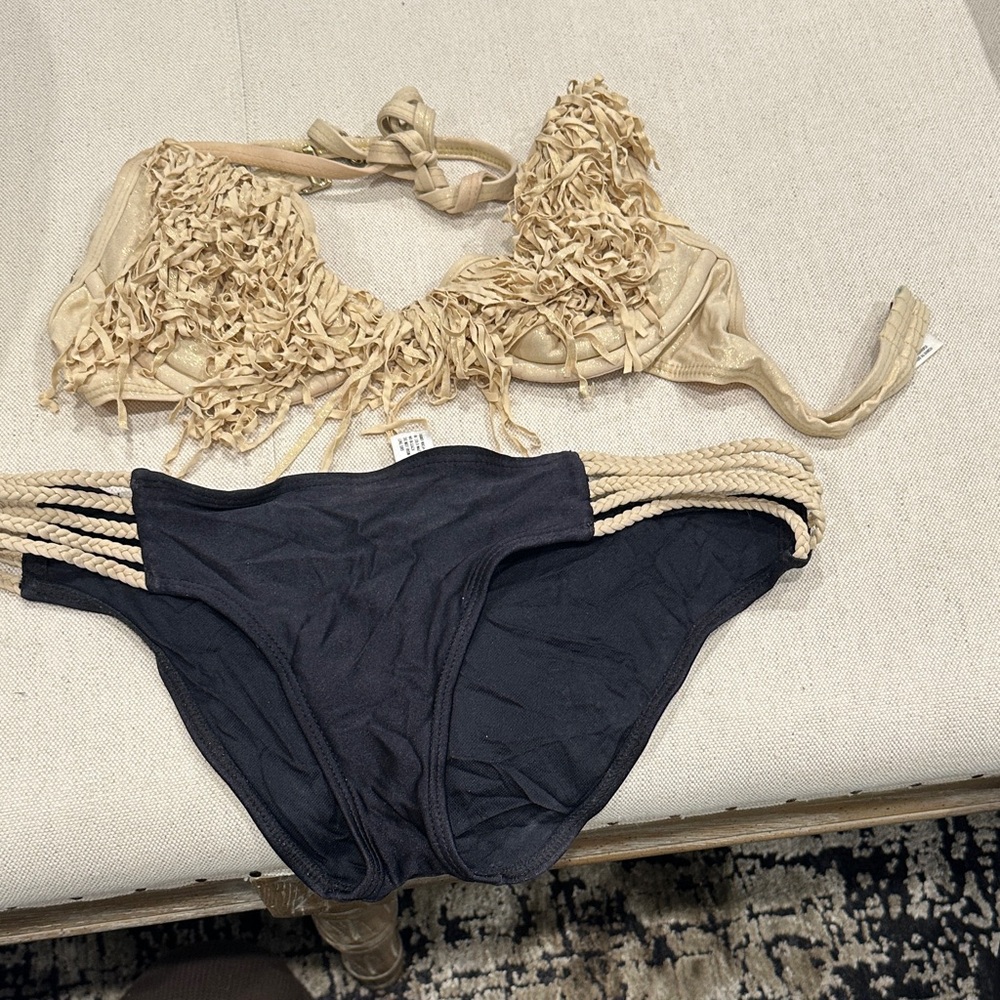 Luli Fama Tan and Black Bikini